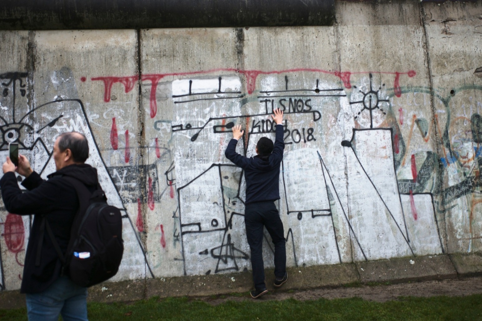 GERMANS MARK THIRTY YEARS SINCE THE BERLIN WALL CAME DOWN. 